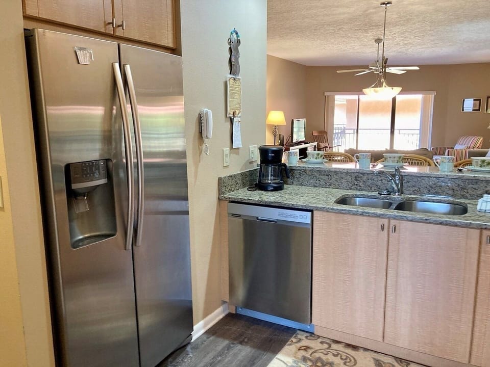 Condo, 2 Bedrooms | Private kitchen | Fridge, microwave, oven, dishwasher