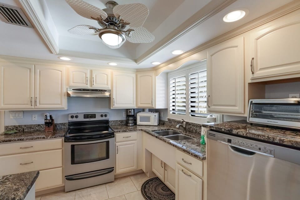Condo, 2 Bedrooms | Private kitchen | Coffee/tea maker, fridge, microwave, dishwasher