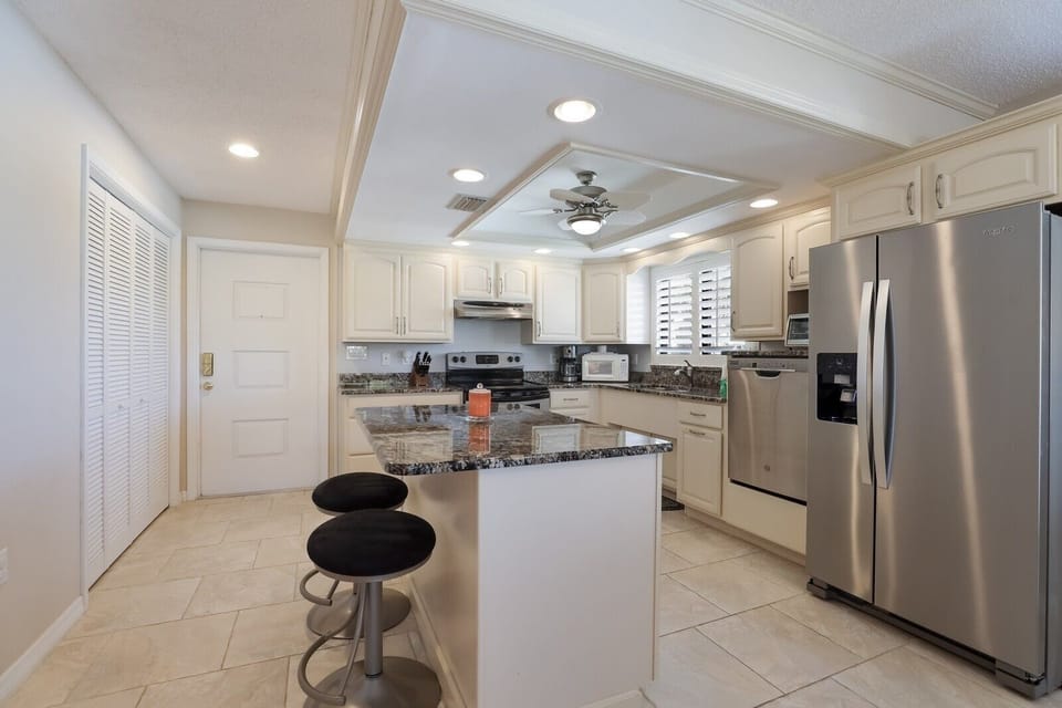 Condo, 2 Bedrooms | Private kitchen | Coffee/tea maker, fridge, microwave, dishwasher