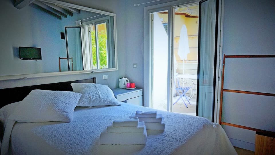 Memory foam beds, minibar, blackout drapes