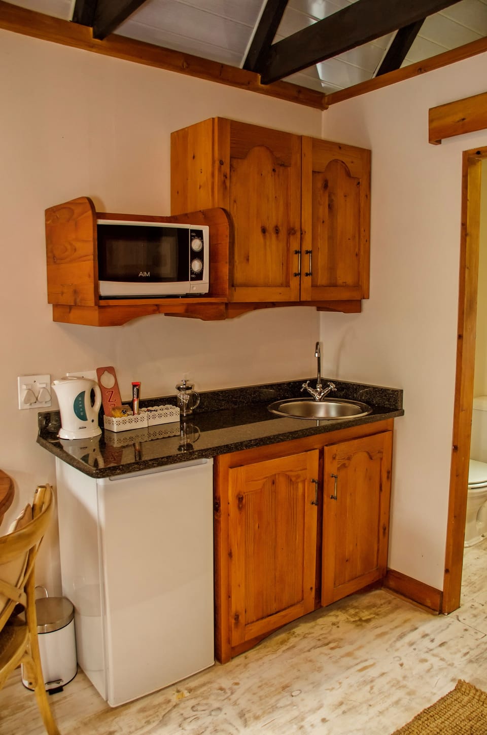 Fridge, microwave, electric kettle, cookware/dishes/utensils