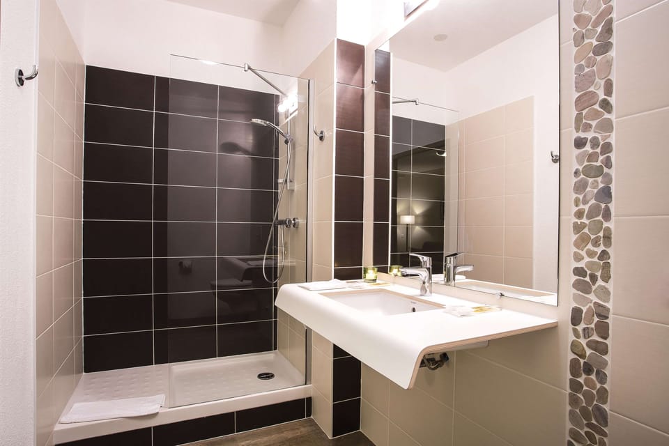Eco-friendly toiletries, hair dryer, towels, soap