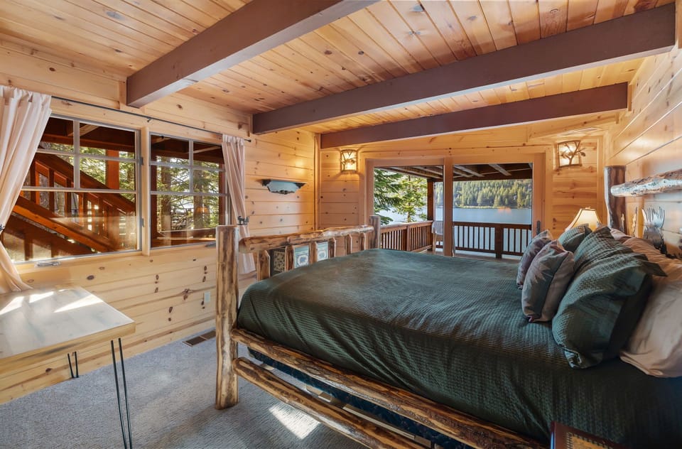 Primary Suite - King Bedroom - Downstairs with access to the lower deck