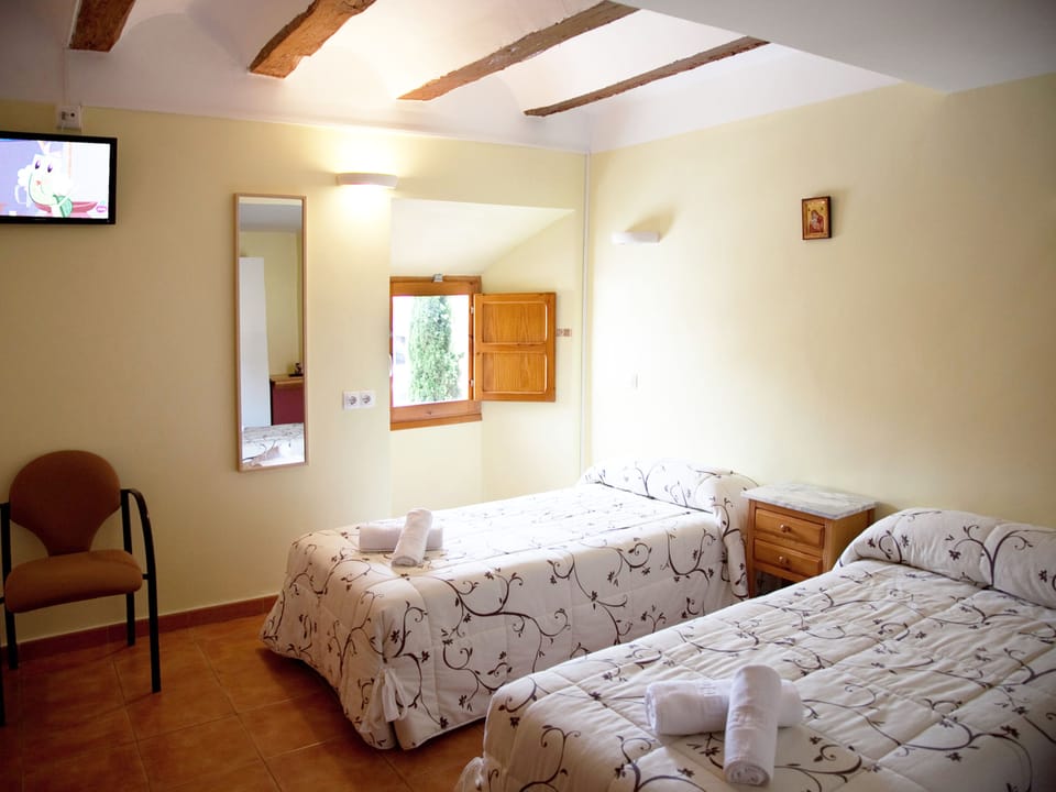 Premium bedding, desk, iron/ironing board, rollaway beds