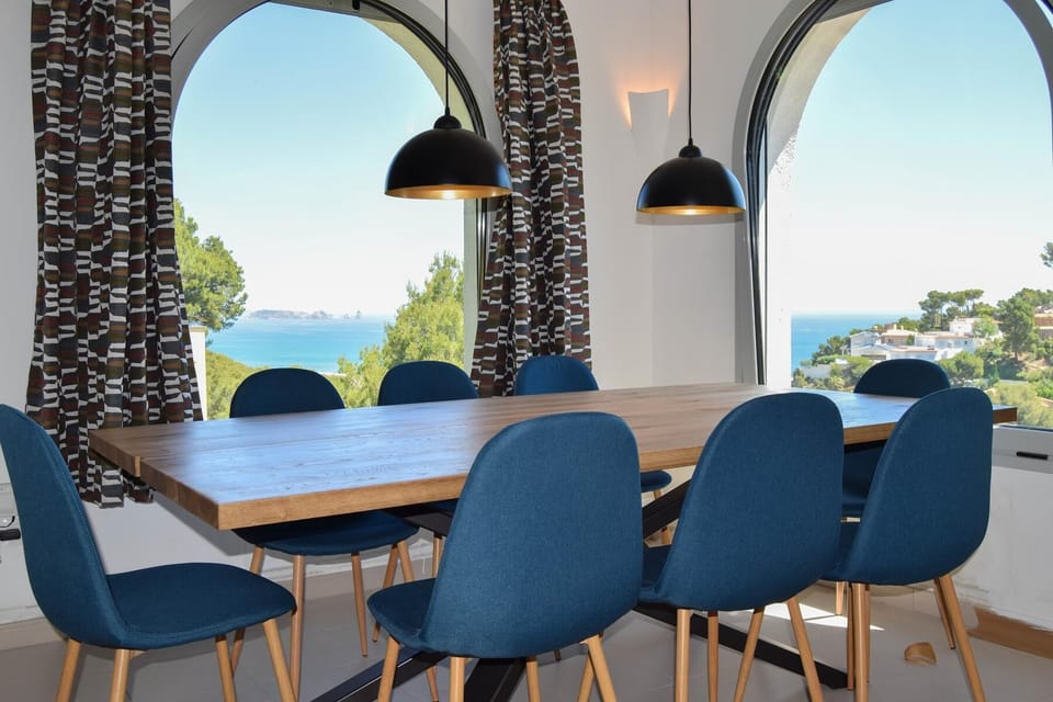 Living and dining  room with sea views and access to terrace-SA PUNTA COSTA BRAV