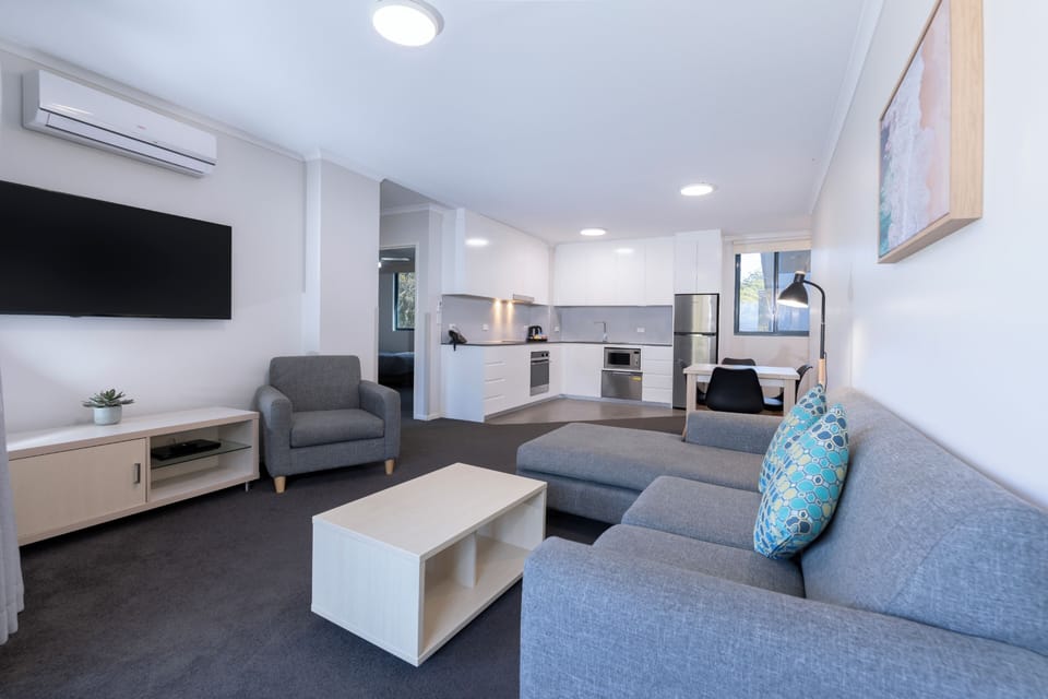 2 Bedroom Non-waterview | Living area | Flat-screen TV, DVD player