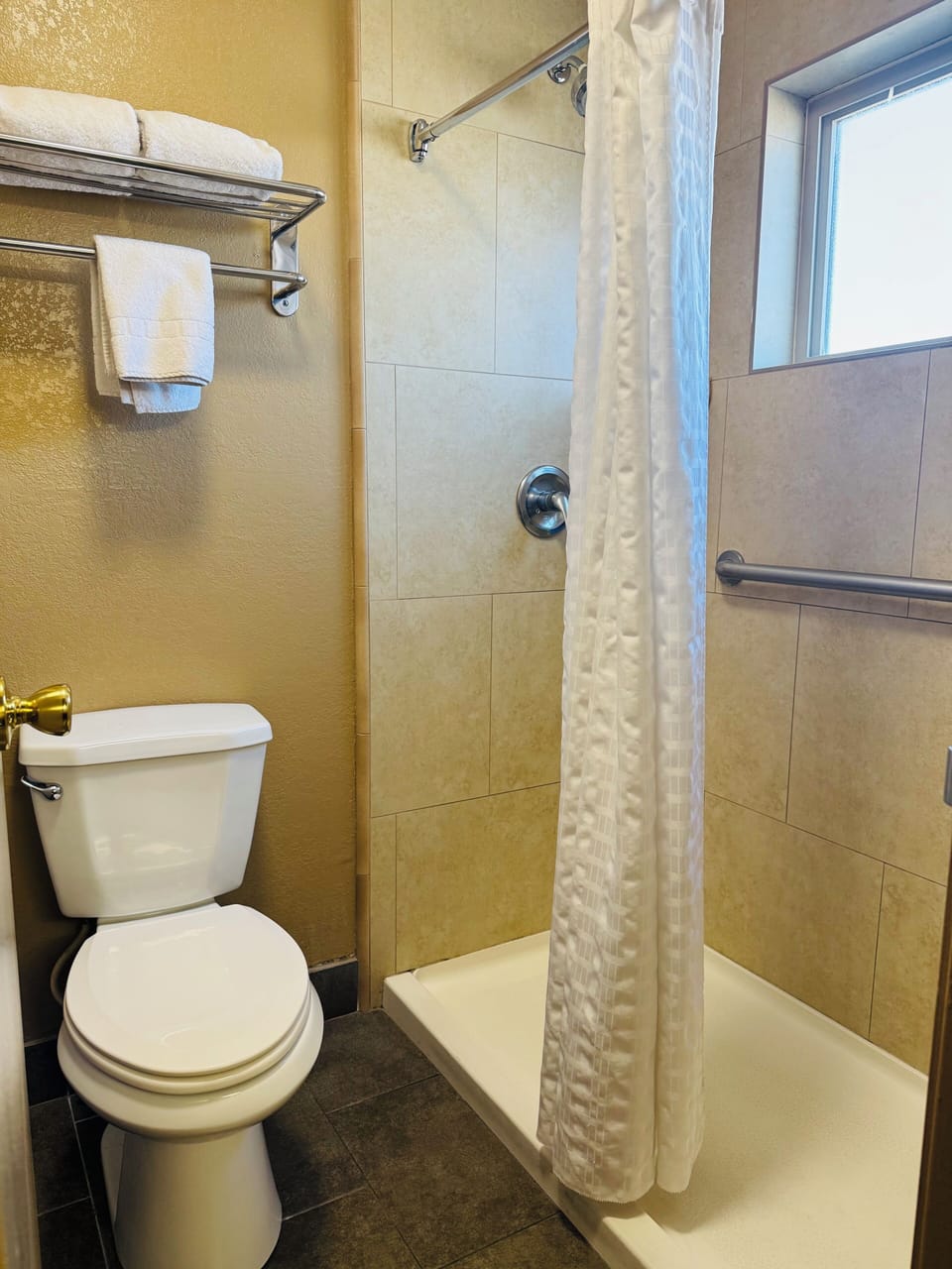 Shower, free toiletries, hair dryer, towels