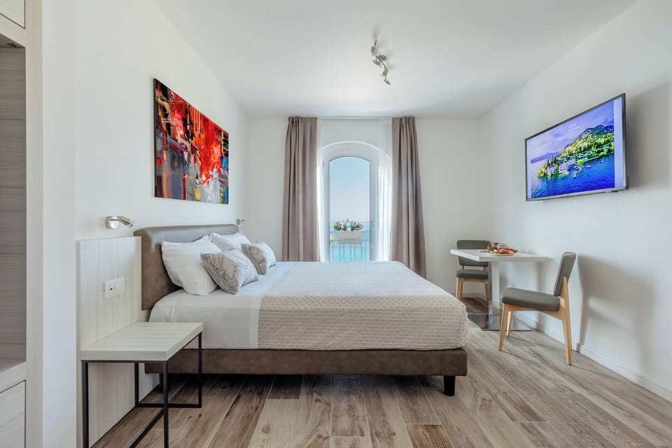 Junior Suite, Non Smoking, Lake View | 2 bedrooms, minibar, in-room safe, desk