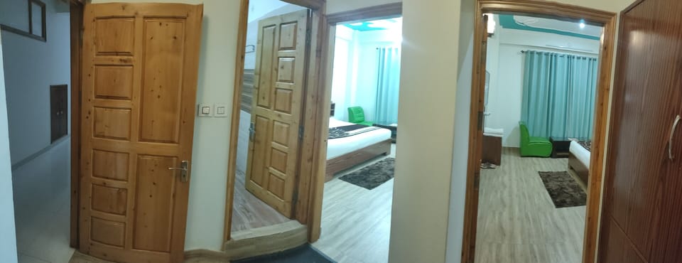 Family Suite, Non Smoking | Living area | 42-inch LED TV with premium channels, TV