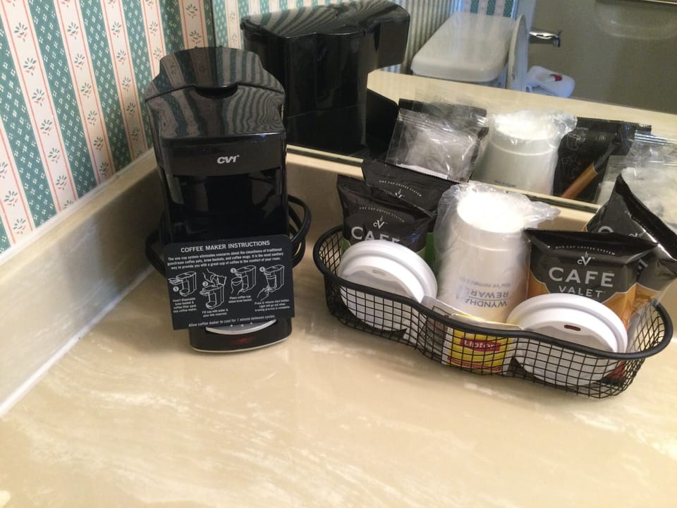 Desk, laptop workspace, iron/ironing board, rollaway beds