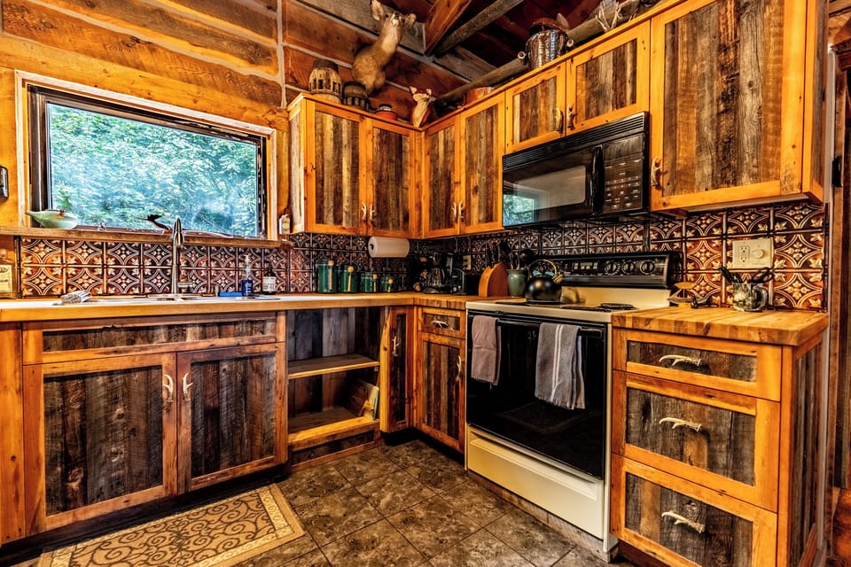 Pressed copper tin tiles, handmade cabinets, coffee, tea and hot chocolate