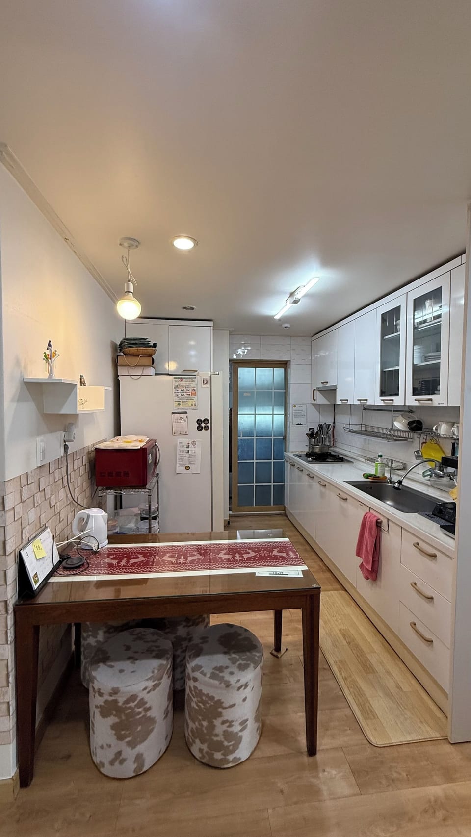 Shared fridge, microwave, coffee/tea maker, cookware/dishes/utensils