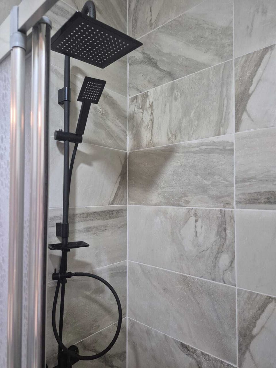 Room | Bathroom | Shower, hair dryer, slippers, towels