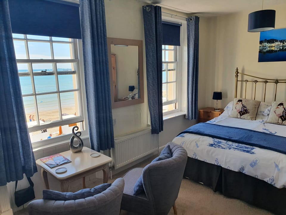 Double Room, Ensuite, Sea View | Iron/ironing board, WiFi, bed sheets