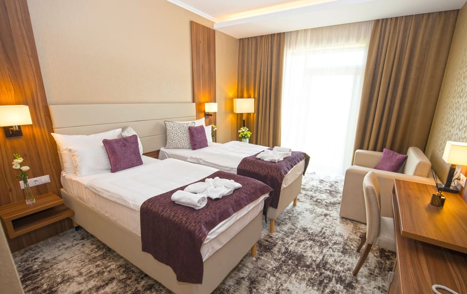 Premium bedding, pillowtop beds, minibar, in-room safe