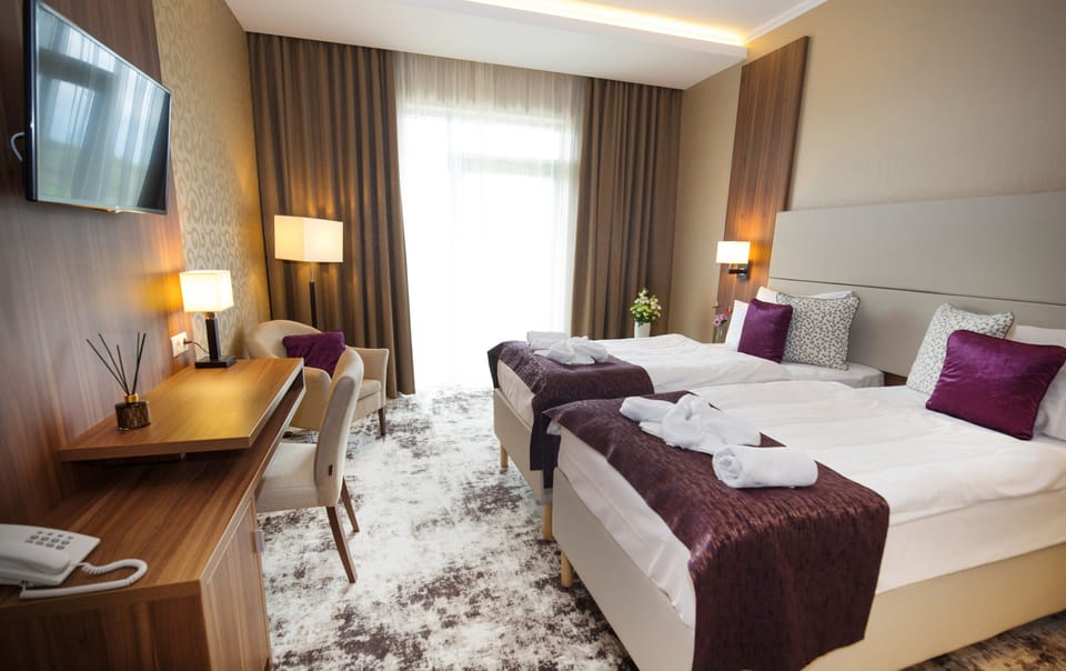 Premium bedding, pillowtop beds, minibar, in-room safe