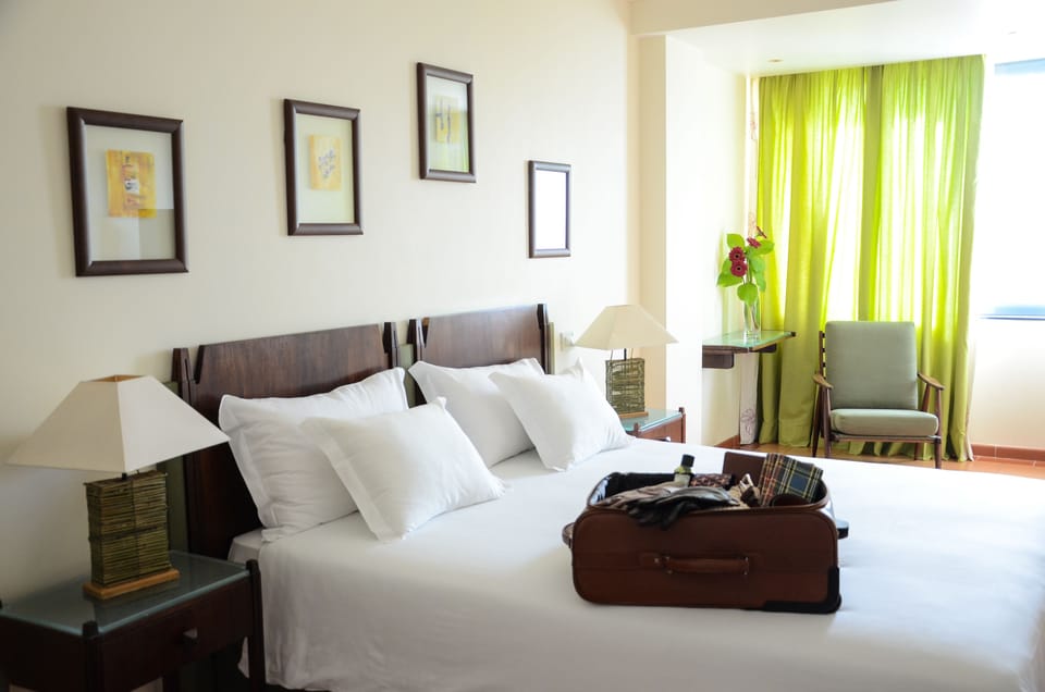 Classic Twin Room | Minibar, in-room safe, desk, soundproofing