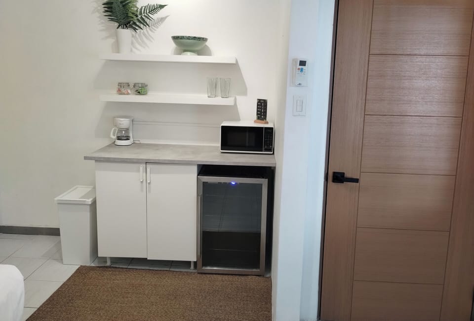 Basic Double Room, 2 Double Beds | Private kitchen | Mini-fridge, microwave, coffee/tea maker, reusable coffee/tea filters