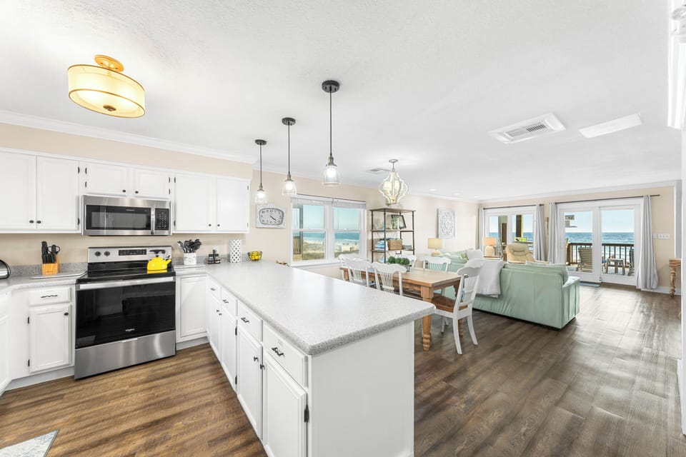 Whip up breakfast with this view, then stroll it straight to the balcony to feast by the ocean.