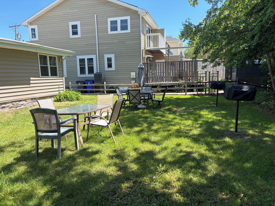 Back yard with new charcoal grills