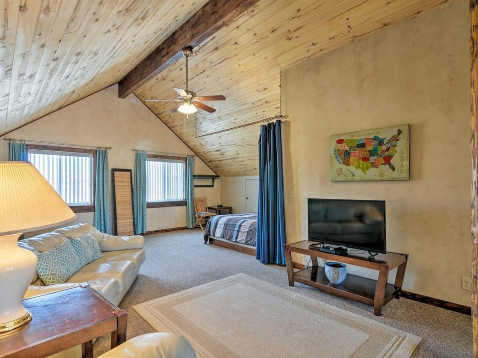 Great room. Queen bed in alcove with privacy curtain.