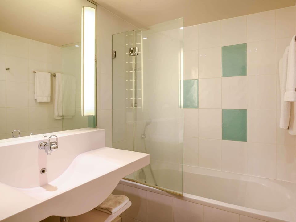 Eco-friendly toiletries, hair dryer, towels, soap