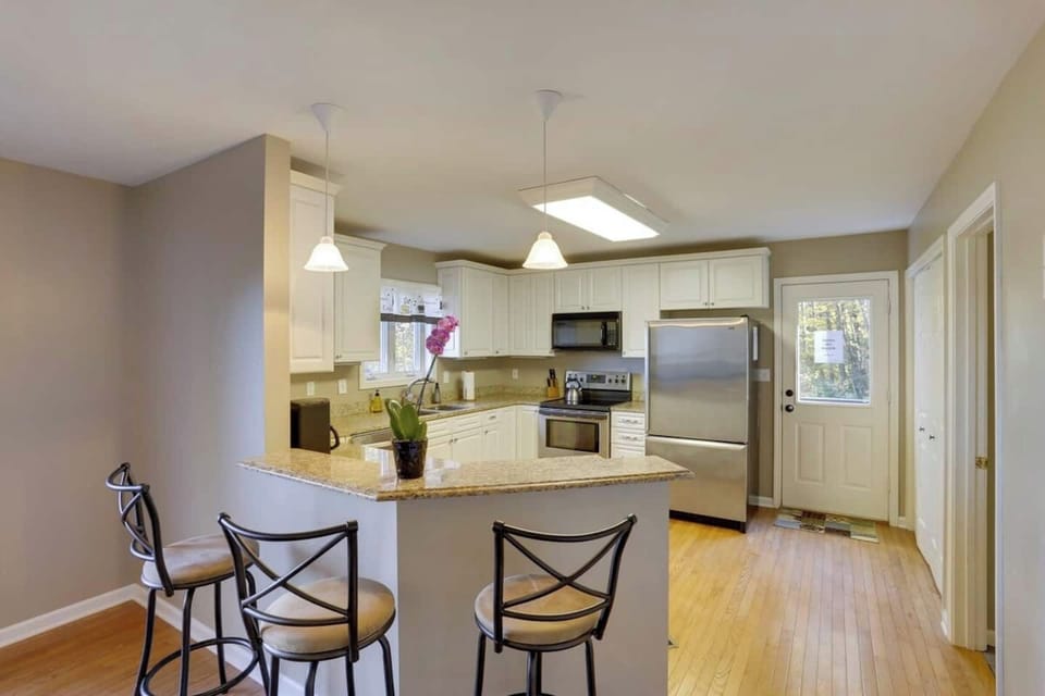 Fully Stocked Kitchen.  Plenty of eating utensils, pots, pans and supplies.