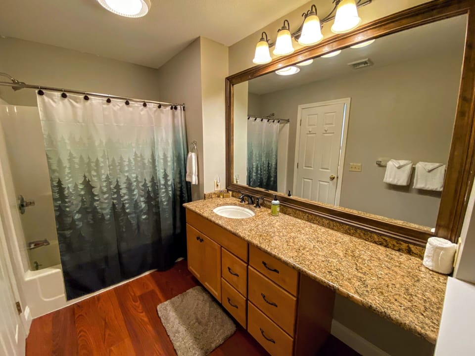 Bathroom with bath/shower combination.