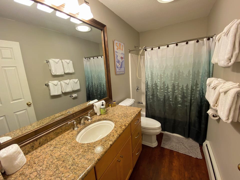 Bathroom with bath/shower combination.