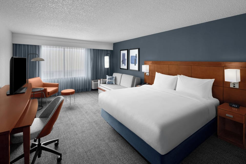 Suite, 1 Bedroom | Desk, iron/ironing board, free WiFi, bed sheets