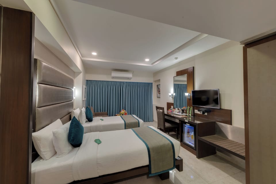 Deluxe Double Room | Pillowtop beds, in-room safe, desk, blackout drapes