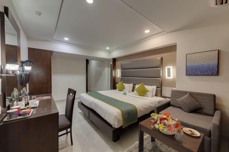 Deluxe Double Room | Pillowtop beds, in-room safe, desk, blackout drapes