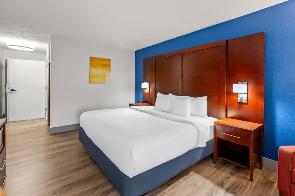 Premium bedding, memory foam beds, desk, laptop workspace