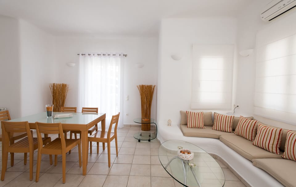 Apartment for 4 people | Living area | 22-inch TV with satellite channels, DVD player