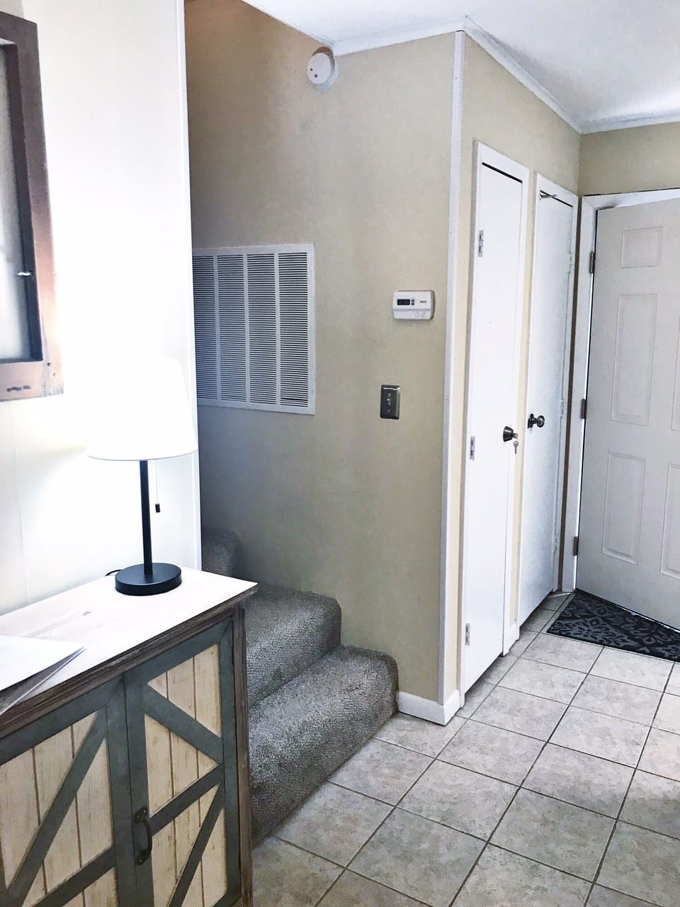 Foyer - joins the front door, kitchen, stairs & half bath is behind front door