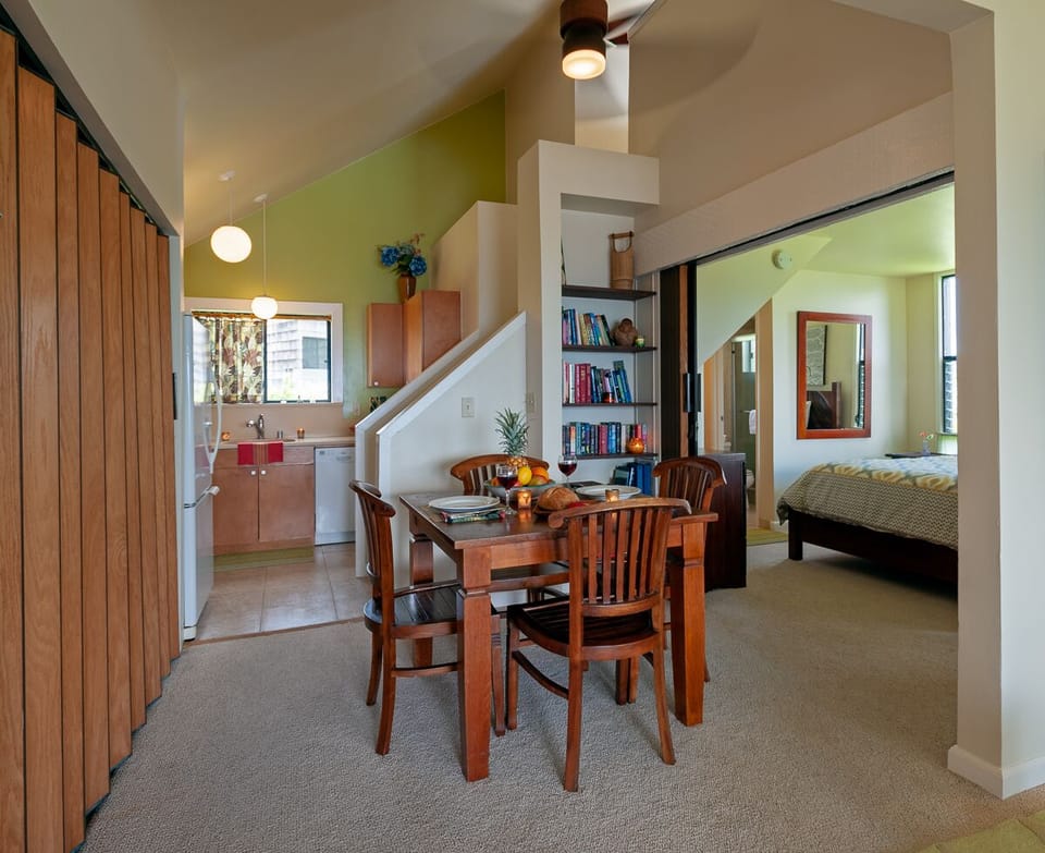 Sealodge G8 | Princeville condos at Sealodge Kauai 8 - Just behind the living room you'll find a cozy dining area for 4! You can enjoy a home cooked meal, plate up some takeout, or play a board game with the family at the table.