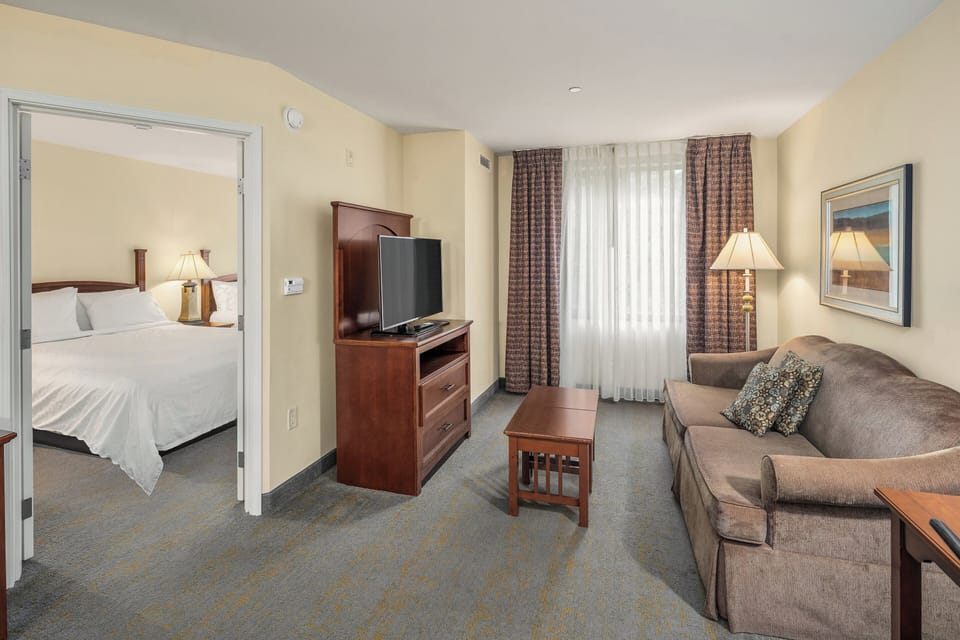 Suite, 2 Queen Beds | In-room safe, desk, laptop workspace, blackout drapes