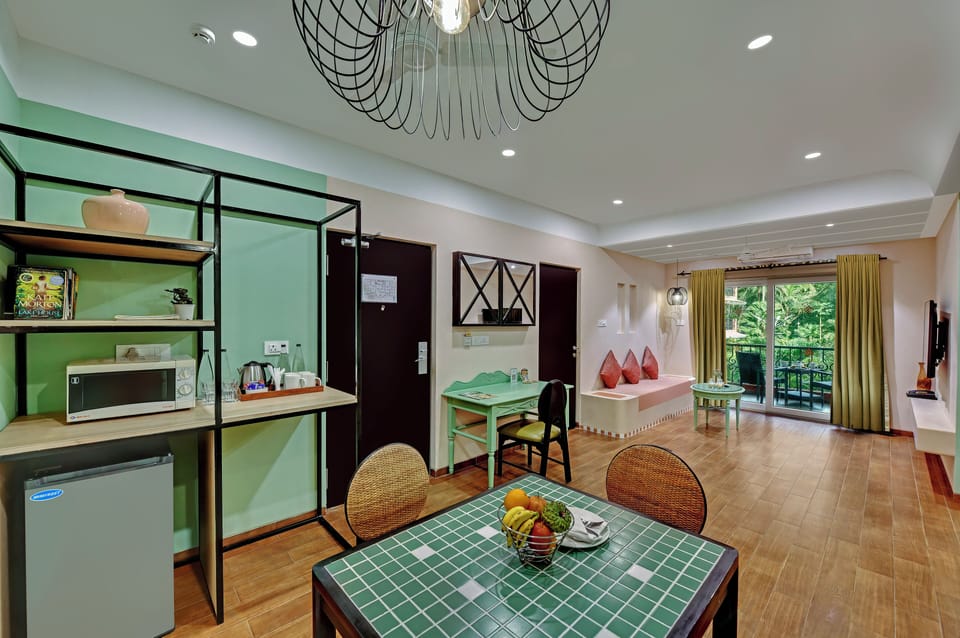 Family Suite, 2 Bedrooms, Garden View | Living area | 32-inch LED TV with cable channels, TV