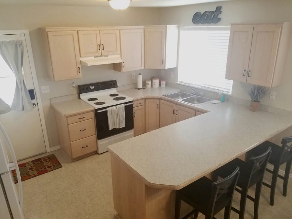 Kitchen and counter seating for three