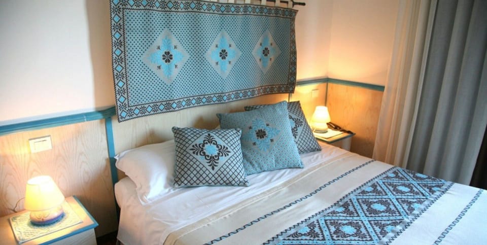 Comfort Double Room, Partial Sea View | Frette Italian sheets, premium bedding, pillowtop beds, minibar
