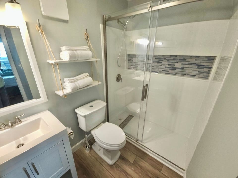 Master Bathroom with 2026 walk-in shower upgrade! All linens provided.