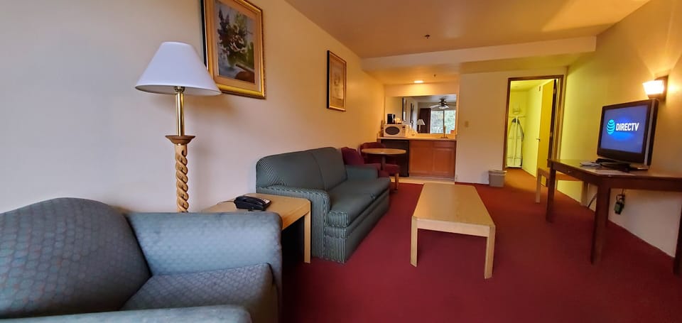 Executive Kitchenette Suite, 1 King Bed, 2 Queen Bed with Sofa Bed, Non Smoking | Desk, laptop workspace, iron/ironing board, free WiFi