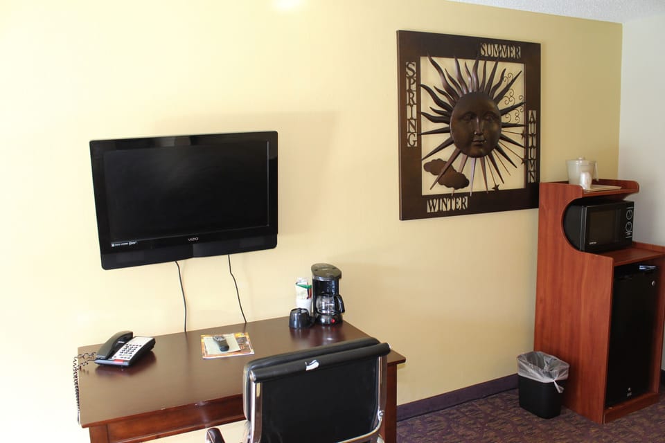 Pillowtop beds, desk, blackout drapes, iron/ironing board