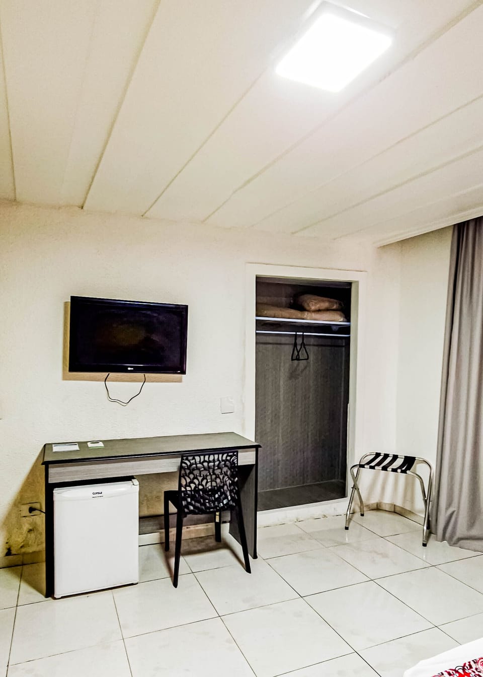 Standard Triple Room | Minibar, desk, laptop workspace, blackout drapes