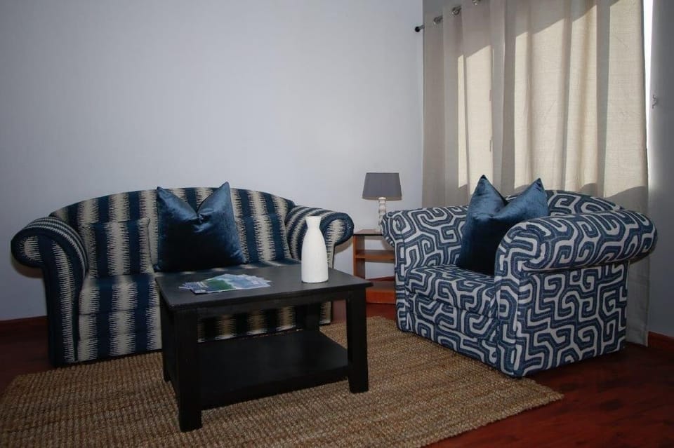 Double Room | Living area | Flat-screen TV