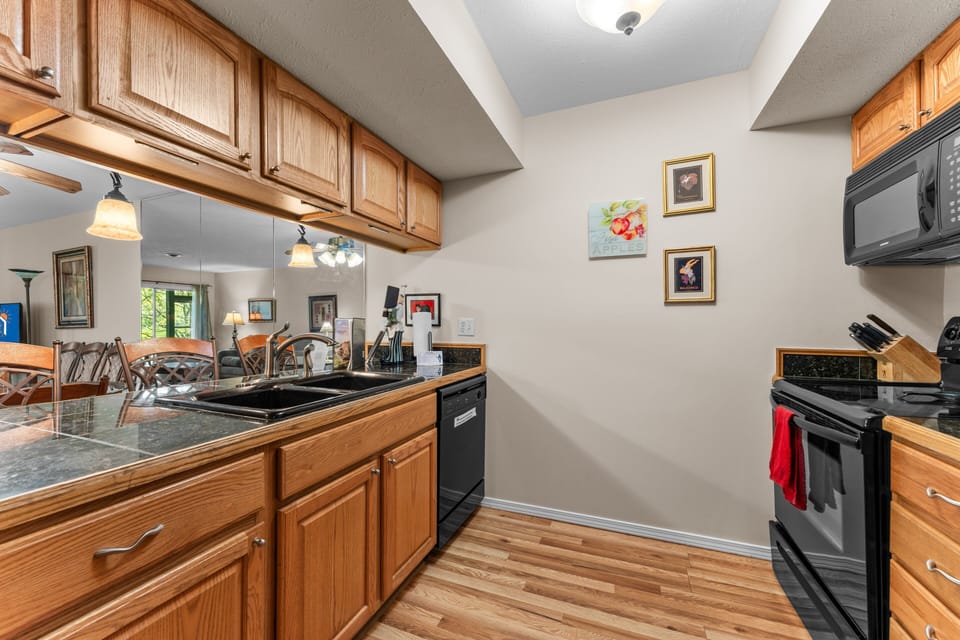 Condo, 2 Bedrooms | Private kitchen | Fridge, microwave, oven, dishwasher