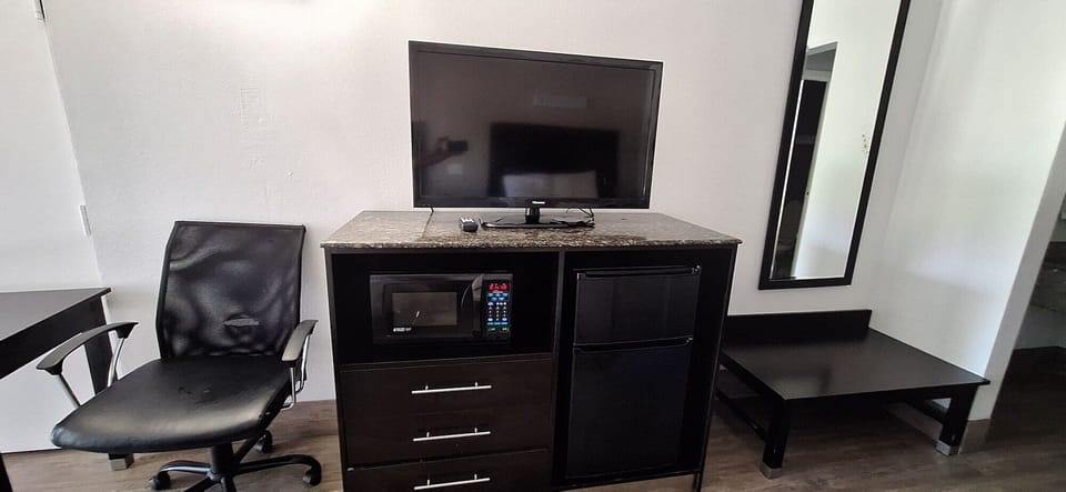 Premium bedding, desk, blackout drapes, iron/ironing board