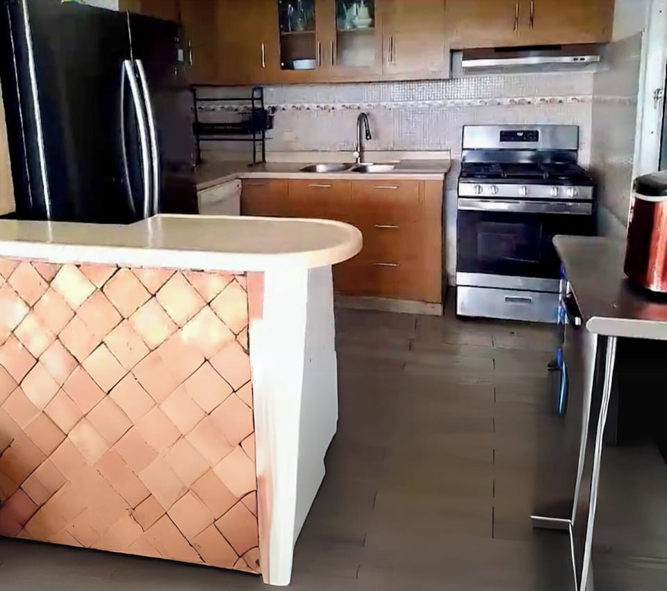 Shared fridge, microwave, cookware/dishes/utensils, cleaning supplies