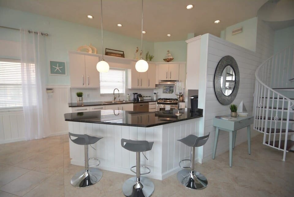 Main level kitchen with bar sitting
