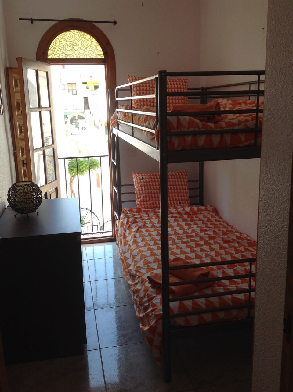 Bunk bed room with view over rear terrace